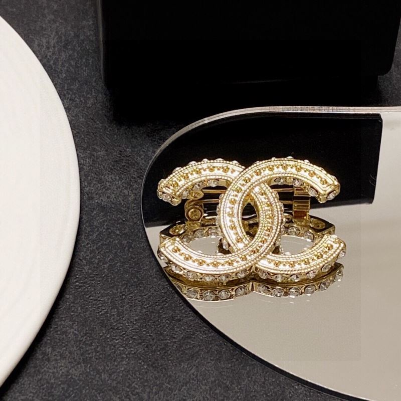 Ch**el brooches